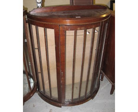 Mid 20th Century stained bow front display cabinet.