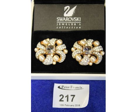 Pair of ladies Swarovski pearl and stone set earrings in original box.