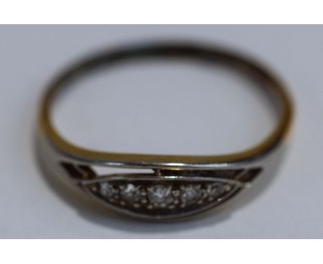 A five stone diamond ring, stamped '18ct', set with graduated single cuts, finger size R, 2.2 g gross, cased