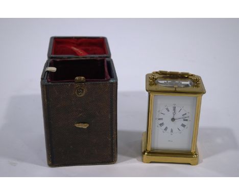 A French brass repeater carriage clock, the movement signed Aiguilles No. 2817 striking on the half hours, 16.5cm high to the