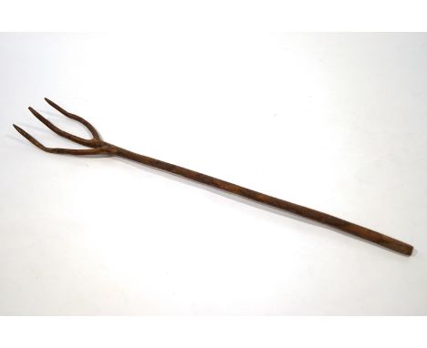 A French rustic wooden pitch fork