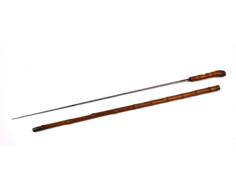 A 19th Century sword stick in a bamboo case with a white metal wire collar