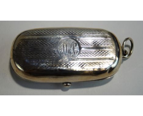 A silver double Sovereign holder, by Cohen & Charles, Birmingham 1909, of rounded rectangular outline with engine turned deco