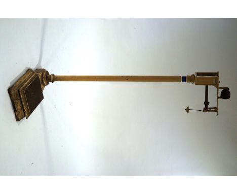 An early 20th Century floor standing shop scales, with weights