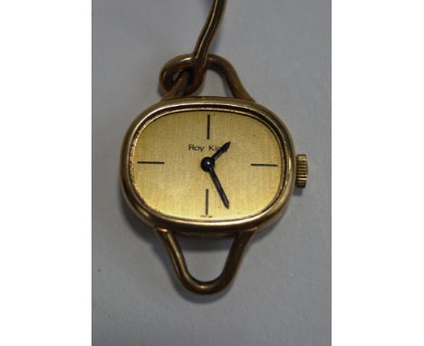 Roy C King, a lady's 9 carat gold bangle watch, London 1977, the TV shaped gilt dial with long black baton quarters and black
