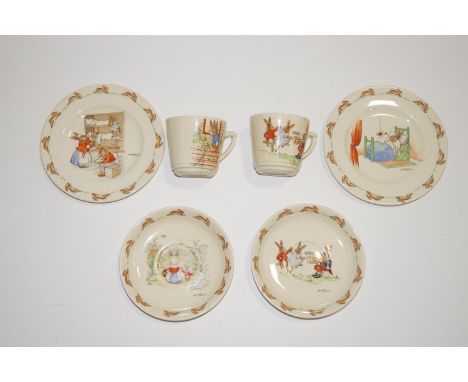 A small quantity of Royal Doulton Bunnykins wares, comprising two cups and saucers and two plates, each printed with scenes b