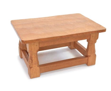 Mouseman Oak Footstool Robert 'Mouseman' Thompson of Kilburn oak footstool, adzed top on four hexagonal supports united by st