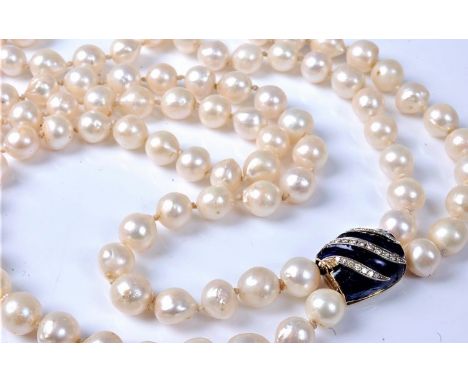 A two strand cultured pearl necklace with diamond and enamel clasp, the two strand of roughly uniform cultured pearls, approx