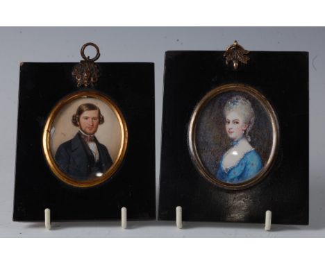 Early 19th century English school - Half-length portrait of a gentleman, wearing a black tunic, miniature watercolour on ivor