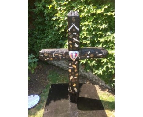 World War One centenary Art Trail - oak Trench Art cross. This 5ft high, charred black, oak trench cross, made from a 70-year