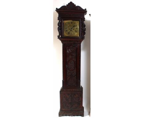 E Courter - 18th century oak cased longcase clock, having signed 11" square brass dial, with cherub mask cast brass corner sp