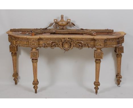 A 19th century French giltwood and gesso console table, the frieze with applied Rococo Revival scroll leaf mouldings, the who