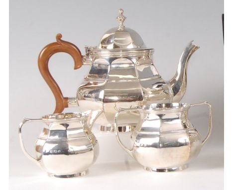 A bachelors three-piece tea set, in the early 18th century style, comprising teapot, twin handled sugar and cream, each of oc