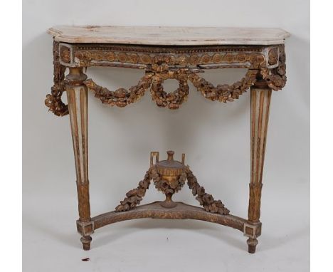 An 18th century French giltwood and gesso console table, having white marble top with moulded edge and serpentine outline, th