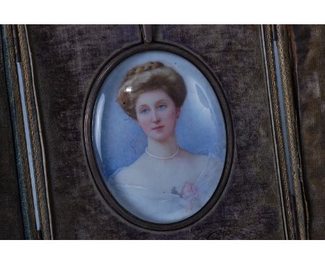 Circa 1900 school - Burt portrait of a maiden wearing her hair up and carnation to her bust, miniature watercolour on ivory, 