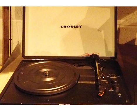 Black Crosley Cruiser 3 speed record player with power supply. P&amp;P Group 2 (£18+VAT for the first lot and £3+VAT for subs