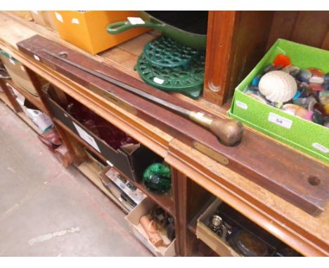 An antique mahogany and brass spirit level and stick. 