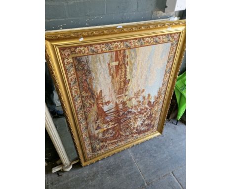 A large gilt framed tapestry, 109cm x 124cm. 