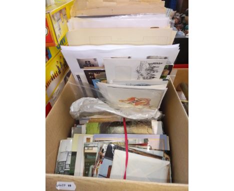 A box containing UK and world stamps, first day covers, postcards and some photos. 