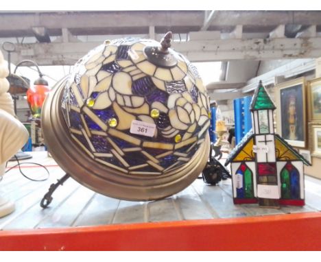 A Tiffany style leaded glass light fitting together with a leaded glass lamp modelled as a chapel.Condition (light fitting on