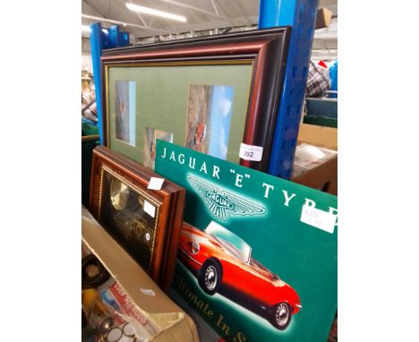 A mixed lot comprising a framed The Postbus In Scotland landrover postcards, a Jaguar clock and reproduction sign. 