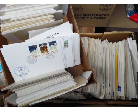 2 boxes of first day covers 