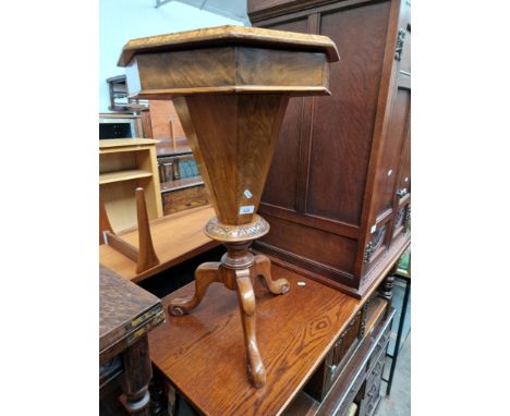 A Victorian inlaid walnut sewing table and a tapestry frame. Dimensions- height 69cm and width 45cm.Condition- there is some 