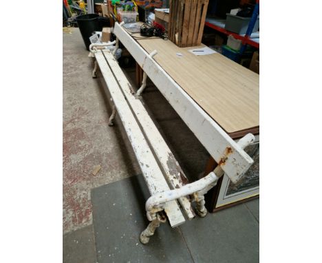A large Victorian cast metal garden bench. 