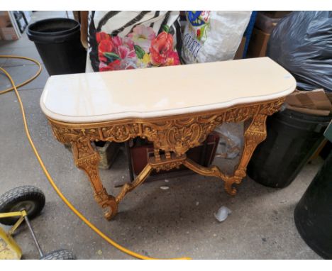 A giltwood and marble top console table. Dimensions: height 46cm, width 90cm and depth 30.5cm.Age: 2nd half of the 20th centu