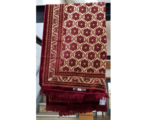 A Turkish Nazar Kadife silk carpet, red ground. 