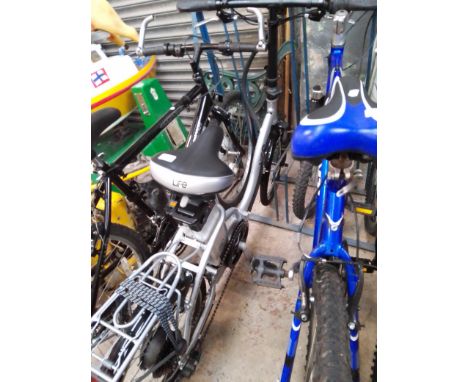 An Elife Explorer folding electric bicycle with instruction manual, full set of tools, keys and charger 