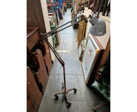 A Herbert Terry &amp; Sons adjustable angle floor lamp.