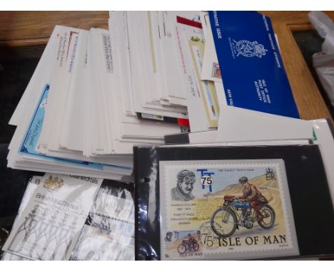 A collection of various first day covers and mint stamps. 