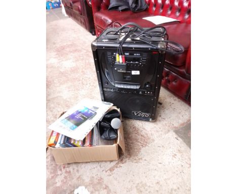 A Blu-ray V2 Go all in one music system with two professional microphones & karaoke disks. Condition r :- ( microphones) make
