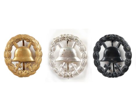 1914-1918 German Imperial Army wound badges. A gold-grade, cut-out wound badge with square vertical pin, retaining all its or
