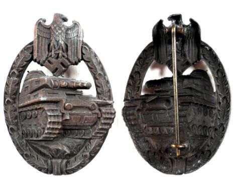 1939-1945 German Wehrmacht / Waffen SS tank battle badge. A mid-war, die-stamped, bronze-grade tank battle badge, with vertic