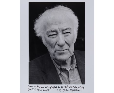 Minihan, John. (b.1946) Original photograph of Seamus Heaney at his 70th birthday in his home in Dublin, 2009 Together with t