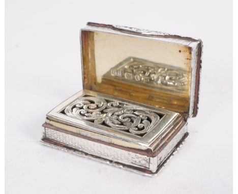 Victorian silver vinaigrette. A Victorian silver rectangular vinaigrette, the scroll moulded rim enclosing an engine-turned b