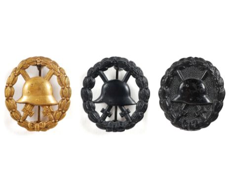 1914-1918 German Imperial Army wound badges. A gold-grade, cut-out wound badge with vertical pin, retaining almost all its or