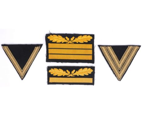 1939-1945 Waffen SS sleeve rank insignia. An Obergruppenfuhrer badge of yellow machine embroidered oakleaves above three yell