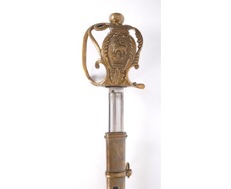 A replica of a pattern 1814 Household Cavalry Officer's dress sword. The double-fullered blade on ornate brass hilt, in brass