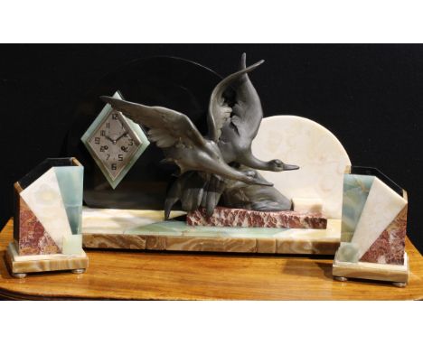 A large Art Deco design marble and onyx mantel clock garniture, modelled as a pair of geese flying towards the moon, 11.5cm l