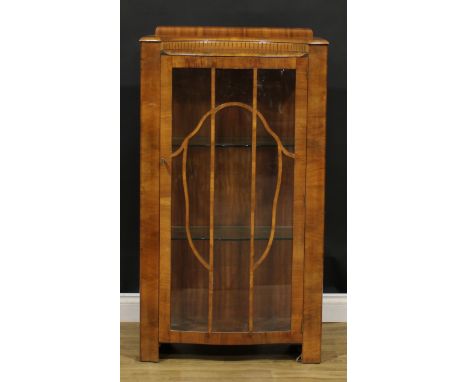 An Art Deco walnut display cabinet, 124cm high, 68.5cm wide, 31cm deep, c.1940 