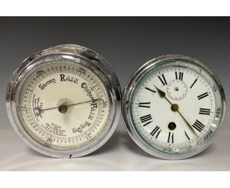 A Marine chrome ships clock, 12cm circular enamel dial, Roman numerals, subsidiary seconds dial and winding hole, 16cm overal