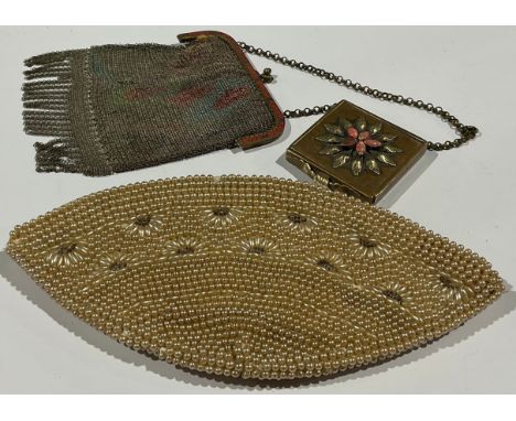 A pearl evening bag; a mesh evening bag; a compact (3) 
