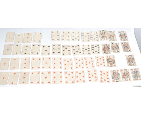 A set of 19th century playing cards, printed in polychrome, to verso with wrigglework and stars in tones of blue, c.1850 
