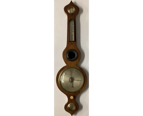 A 19th century mahogany wheel barometer, onion shaped shaped cresting, silvered resister hygrometer, alcohol thermometer, con