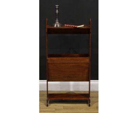 An Edwardian Art Nouveau mahogany periodical stand, the sides pierced with organic motifs, sledge base, 87cm high, 44cm wide,