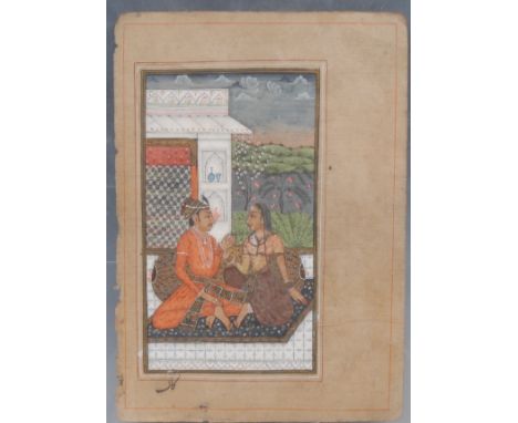 An Indian manuscript page, painted in watercolour and gouache with with an amorous couple, caligraphy text to verso, 21cm x 1