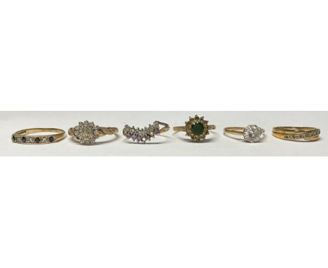 A 9ct gold cluster dress ring, set with green and white stones, size O, marked 375, 1.8g; five other 9ct gold dress rings, 9g